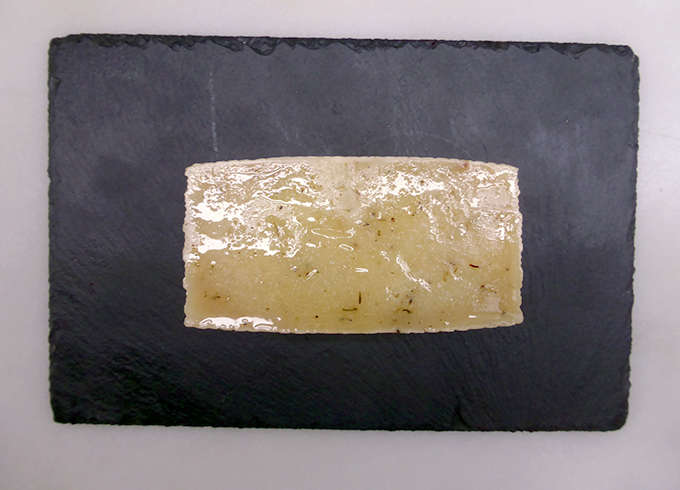 Herb cured sheep cheese