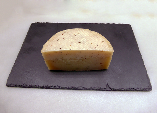 Herb cured sheep cheese